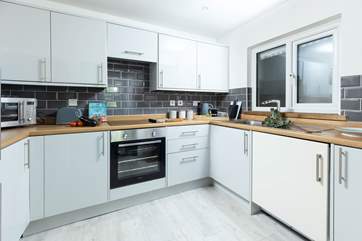 The kitchen is spacious and light. A great space to whip up a feast.