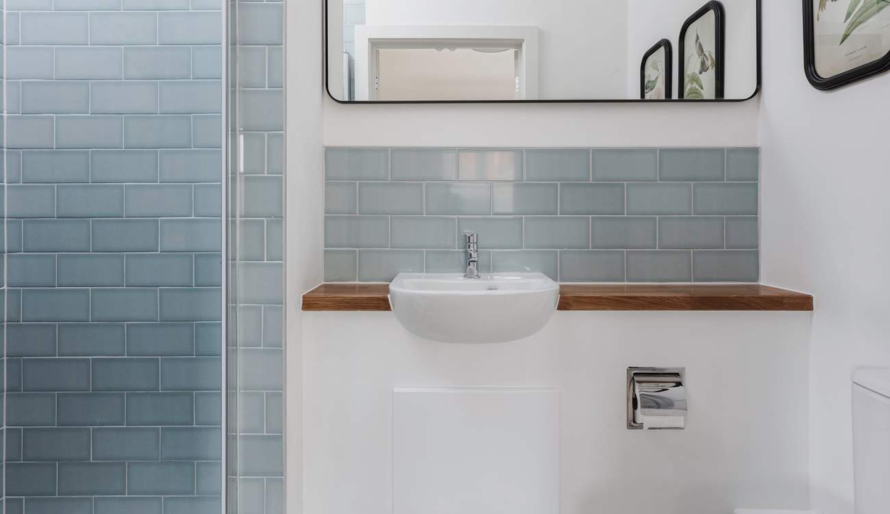 Both bedrooms have en suite shower-rooms.