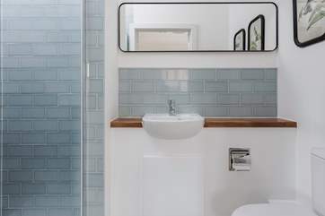 Both bedrooms have en suite shower-rooms.