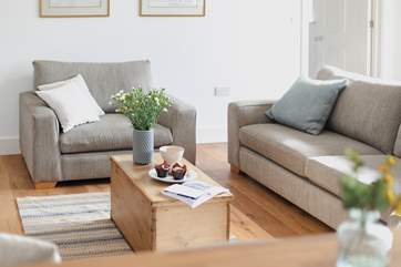 The sitting-area is comfy and bright.
