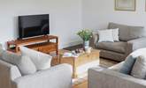 Relax in the cosy sitting area. - Thumbnail Image