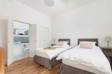 Bedroom 2 is light and airy.