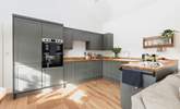 Everyone will want to cook dinner in this classic kitchen. - Thumbnail Image