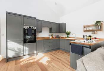 Everyone will want to cook dinner in this classic kitchen.