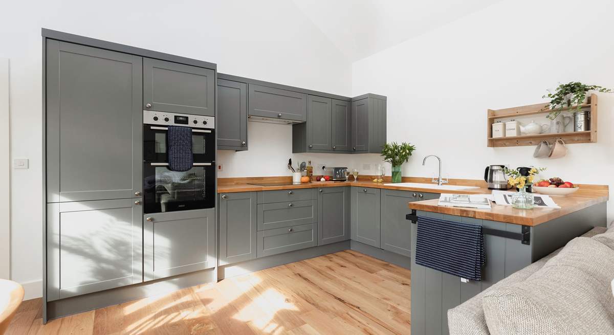 Everyone will want to cook dinner in this classic kitchen.