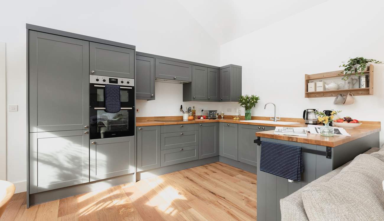 Everyone will want to cook dinner in this classic kitchen.