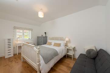 Switch off in this rural setting. This is bedroom three. Please note that for 2022, this bed is being changed to a zip-and-link that can be twins, or a double.
