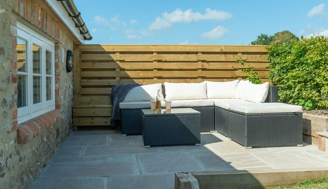 Perfect spot to curl up with a book and glass of something chilled.