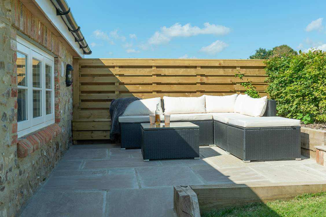 Perfect spot to curl up with a book and glass of something chilled.