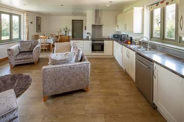 The kitchen offers a glorious space to whip up any feast.