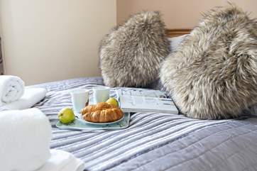 Breakfast in bed... you are on holiday.
