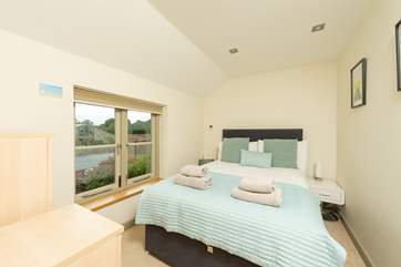 Three stylish bedrooms occupy the first floor.