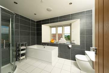 The family bathroom is modern and stylish.