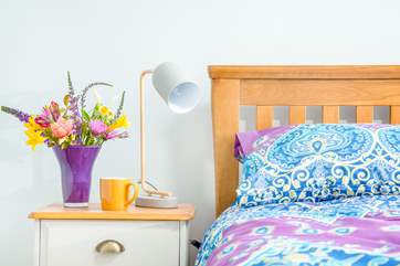 The main bedroom with a comfortable king-size bed.