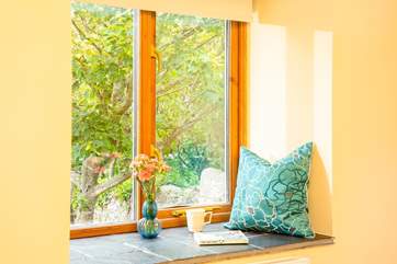 The perfect sunny reading spot in the twin room, looking into the garden.