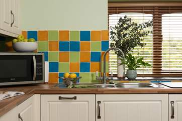 The kitchen is a lovely and light space.