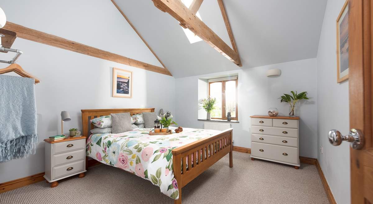 The light and spacious main bedroom with storage for your holiday belongings.