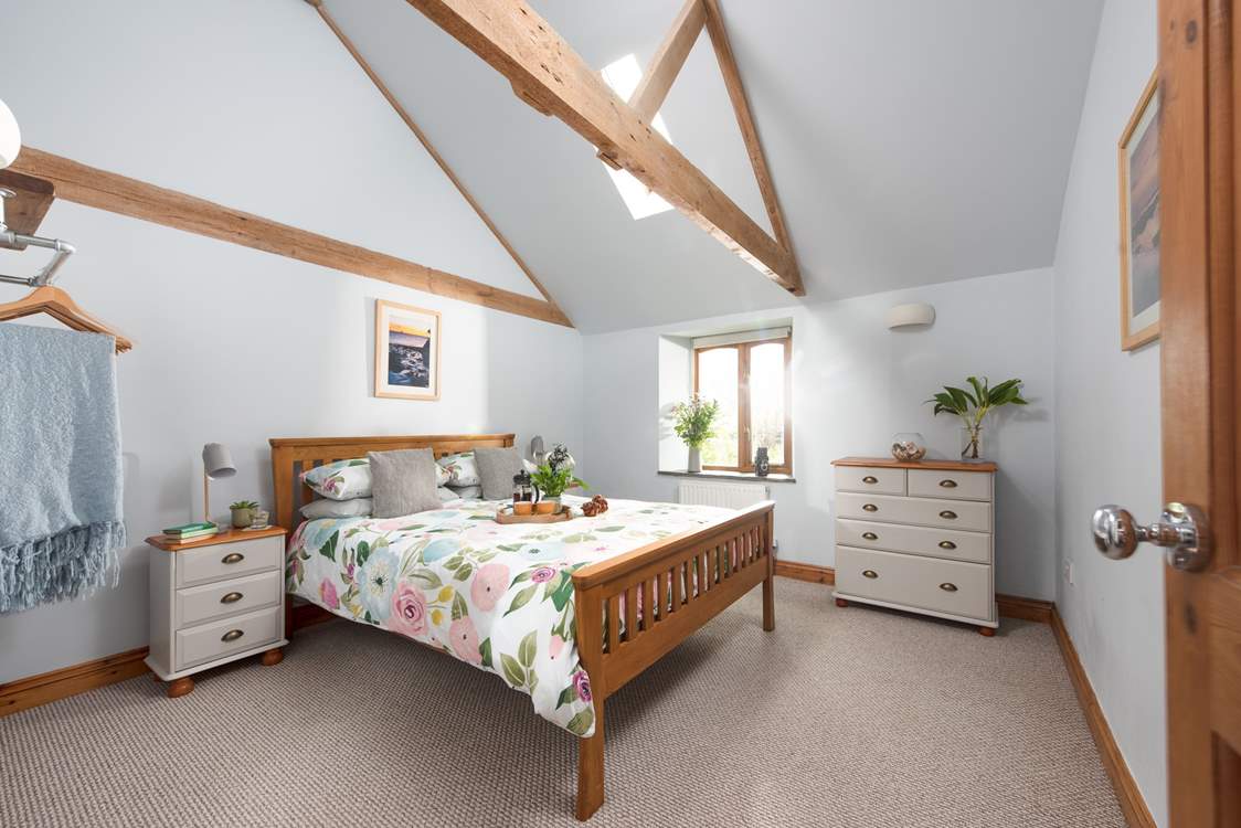 The light and spacious main bedroom with storage for your holiday belongings.