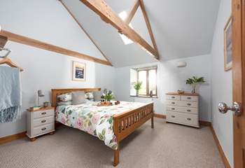 The light and spacious main bedroom with storage for your holiday belongings.