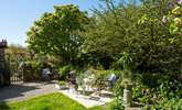 The pretty garden is the perfect spot to unwind after a day out and about.  - Thumbnail Image