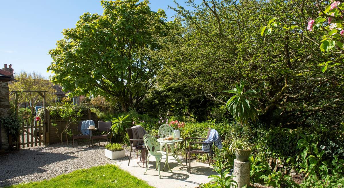 The pretty garden is the perfect spot to unwind after a day out and about. 