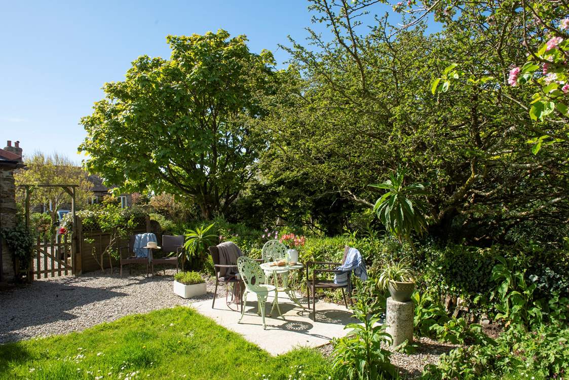 The pretty garden is the perfect spot to unwind after a day out and about.