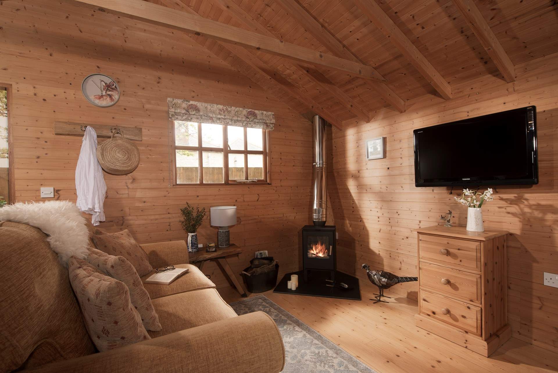 Snuggle up by the fire with a good book after a day of exploring the rugged Cornish coastlines.