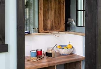 Enjoy preparing a tasty breakfast in the crisp morning breeze.