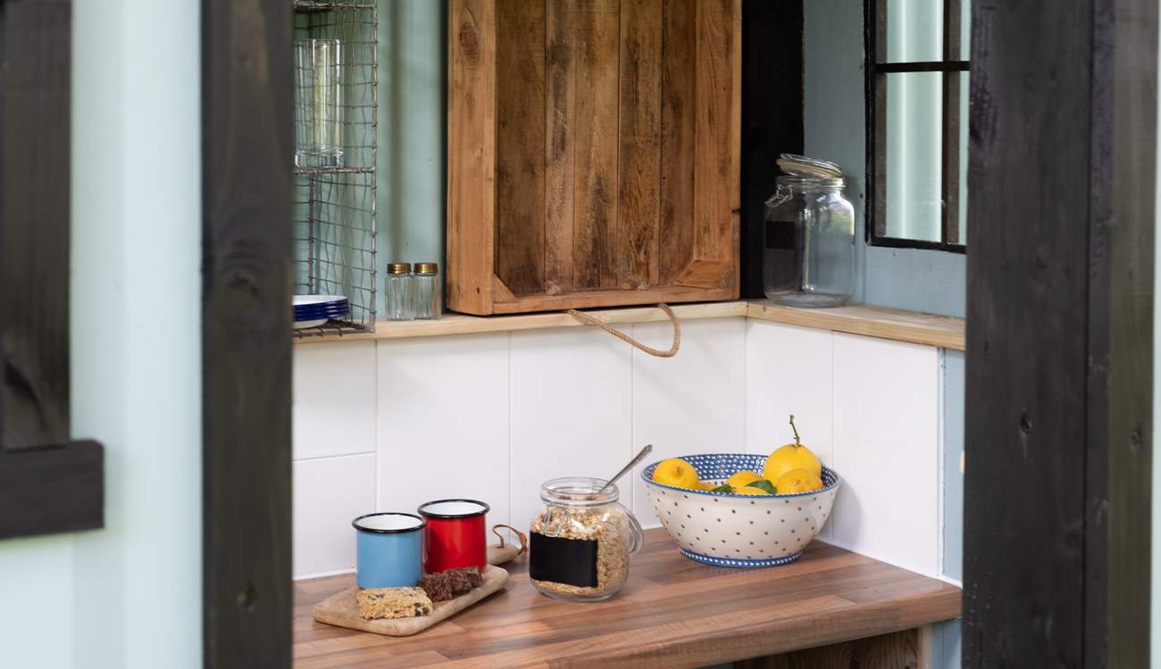 Enjoy preparing a tasty breakfast in the crisp morning breeze.