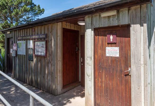 The shared toilet and shower  facilities can be found at the bottom of the field.
