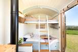 Little ones will adore the snug bunk-beds.