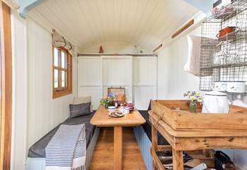 The charming dining area is great for family meals.