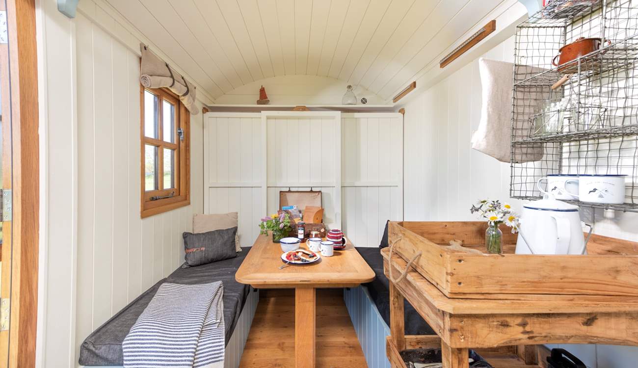 The charming dining area is great for family meals.