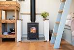 Snuggle up around the indulgent wood-burning stove in the evenings.