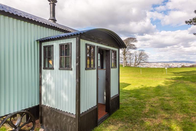 The compact kitchen can be found at the rear of the hut.