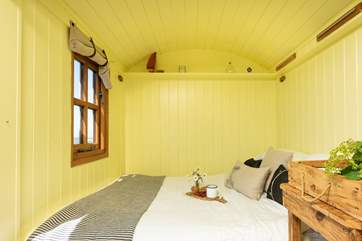 The dining area can be transformed into an inviting double bed.