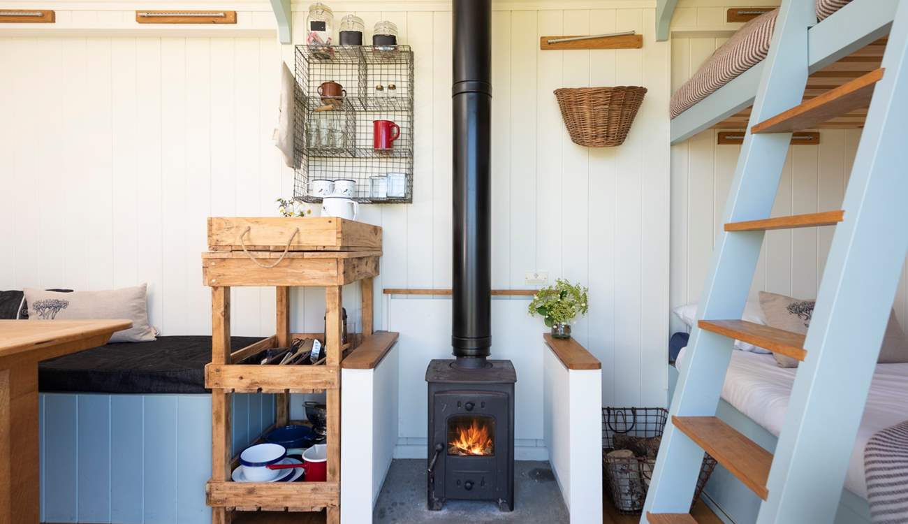 As the sun dips beyond the horizon, light the wood-burner and get cosy. 