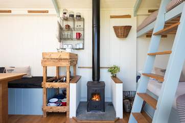 As the sun dips beyond the horizon, light the wood-burner and get cosy.