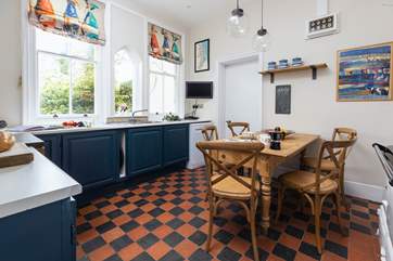 This charming kitchen/diner has been decorated perfectly to complement all of the cottages original features.