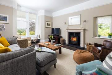 Cosy up in the sitting-room next to the wood-burning stove.