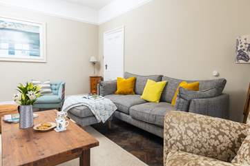 The sitting-room provides plenty of comfortable seating.