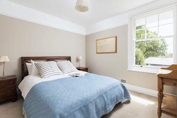 Bedroom 4 has a neutral colour palette, giving it a very relaxing feel.