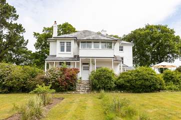 Cross Park is a striking detached house surrounded by beautiful private gardens.