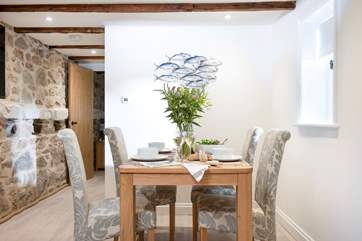 The dining area with large TV.
