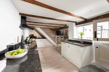 The sleek and contemporary kitchen/diner is well-equipped with everything you need to create those fabulous holiday breakfasts or lazy evening suppers.