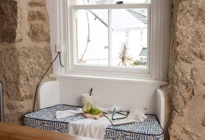 There are lovely areas throughout the cottage, this window seat has a little rope around it. Because its located at the top of the stairs, we wouldn't want any children harming themselves. 