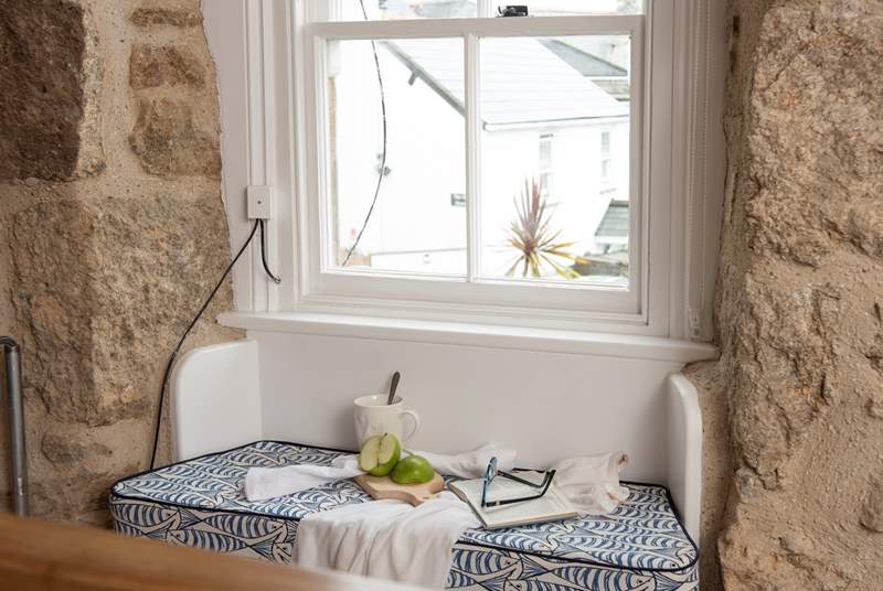 There are lovely areas throughout the cottage, this window seat has a little rope around it. Because its located at the top of the stairs, we wouldn't want any children harming themselves. 