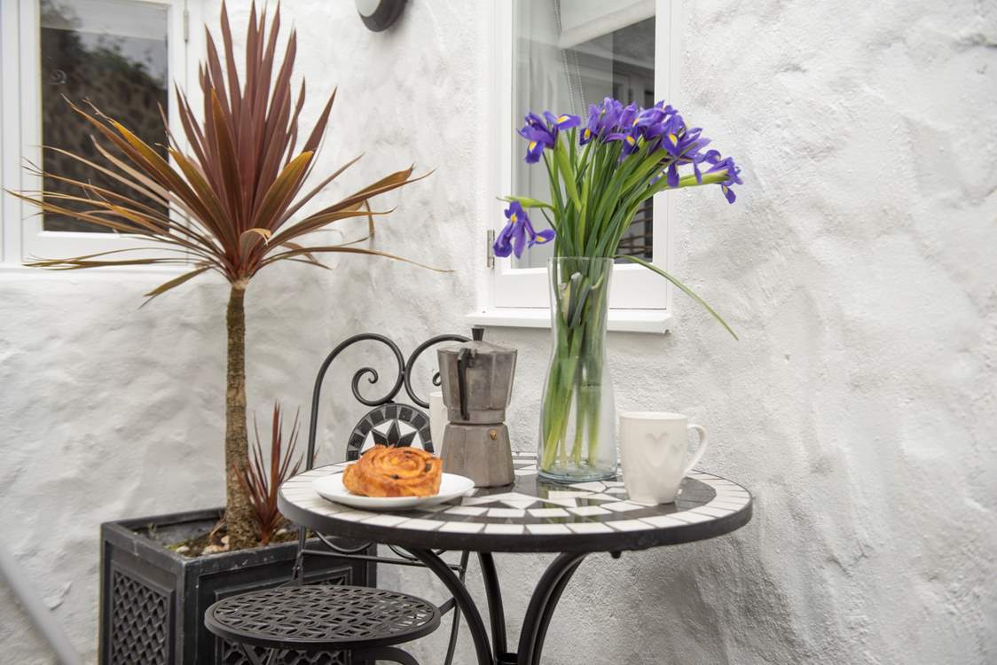 The rear courtyard is the perfect spot for a morning coffee.