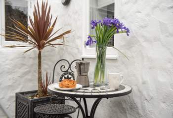 The rear courtyard is the perfect spot for a morning coffee.