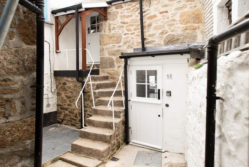 The Hideaway is tucked away in a secluded spot reached via a little cobbled lane. 13 steps lead up to the first floor stable-door..